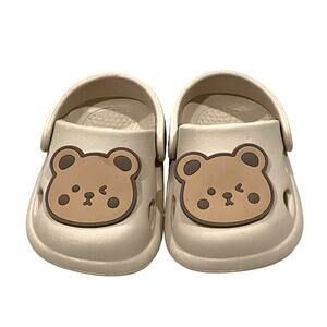 Baby's capybara-themed clogs or slippers in a beige cream tan color Size 1 / 2